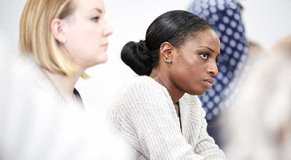 Two ladies in a classroom environment